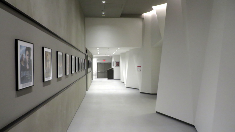The hallways of the brand-new campus are lined with 150 framed movie posters listing the names of VFS grads who worked on the production