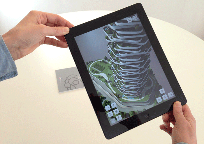 A next generation residential building that will be built in Shanghai. Using a tag on a desk, users can walk around and see the 3D building model on a tablet